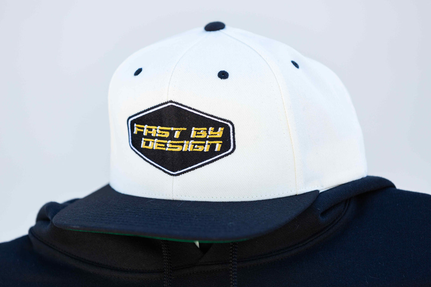 Fast By Design Gold Hat